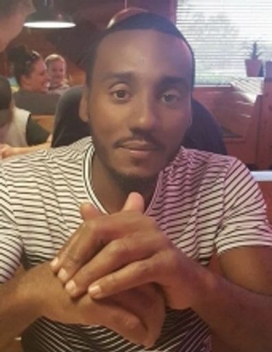 Christopher Hasan Russell Profile Photo
