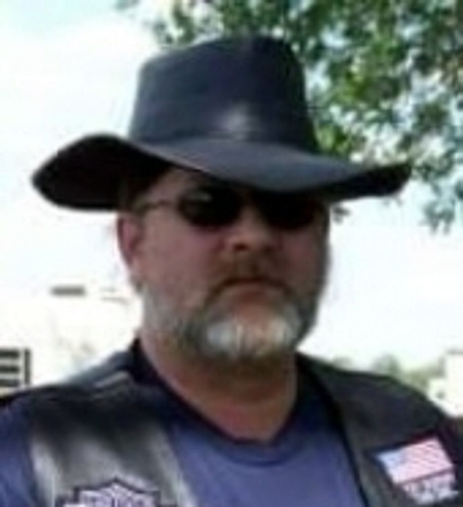Leonard G. “Leo” Holmes