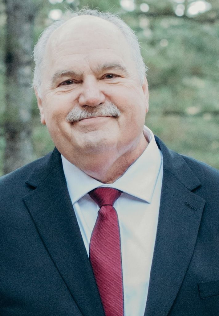 Ernest F Skare II