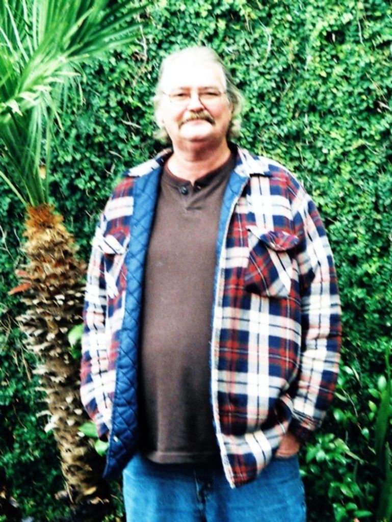 Raymond, Larry R.
