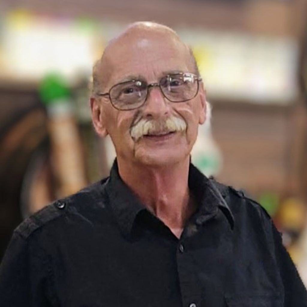 Mark G. Adam