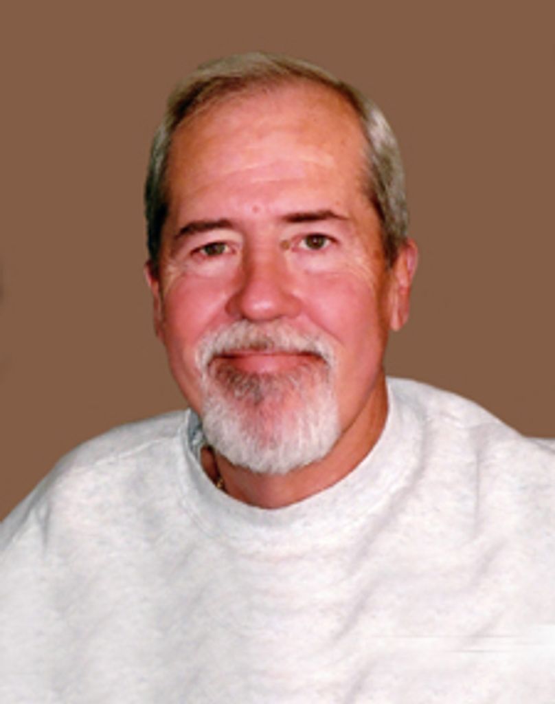 Thomas  E. Leugers