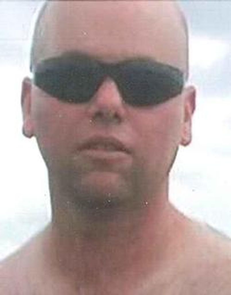 Nicholas "Nick" John Oleson