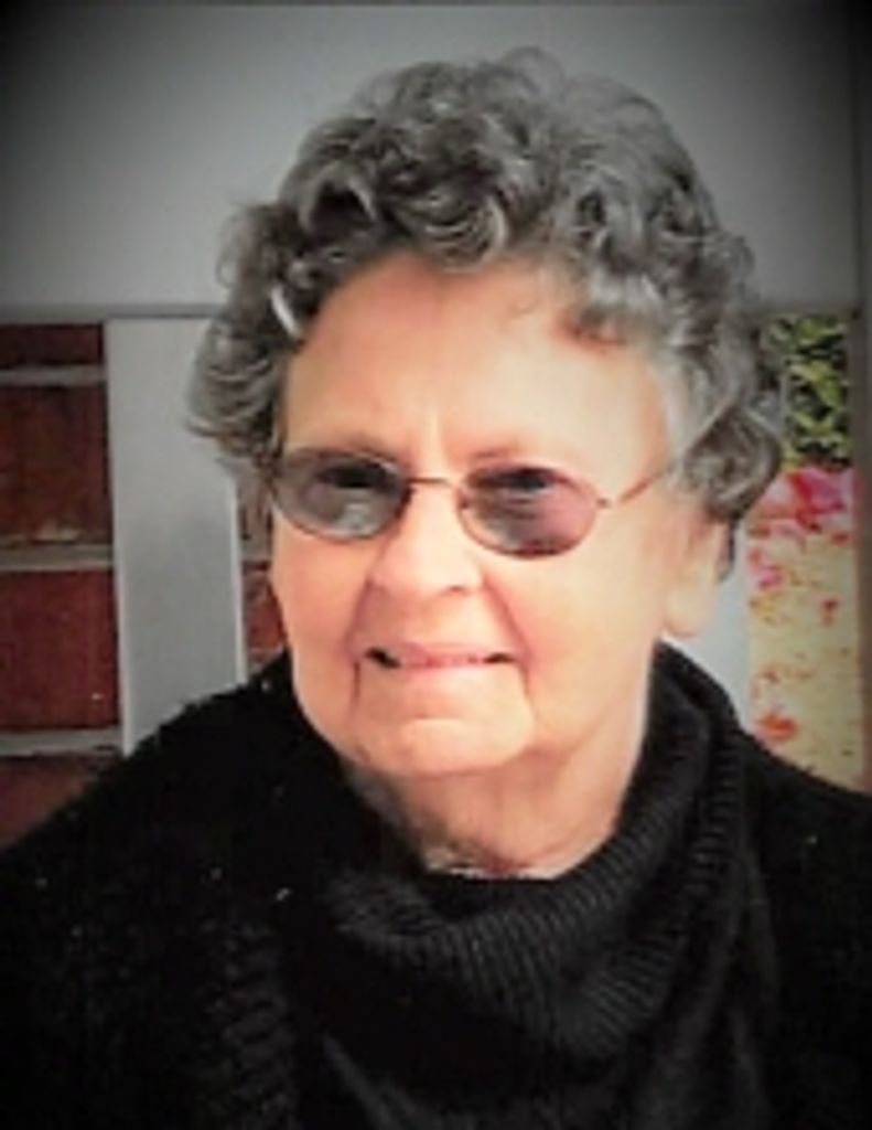 Loretta Louviere Migues