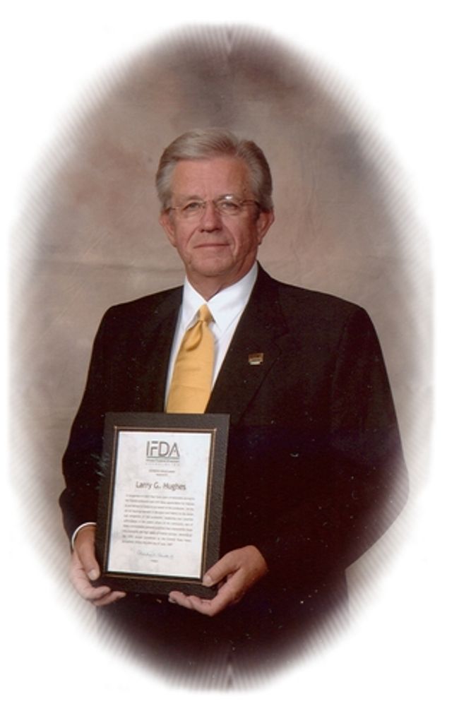 Mr. Larry G. Hughes