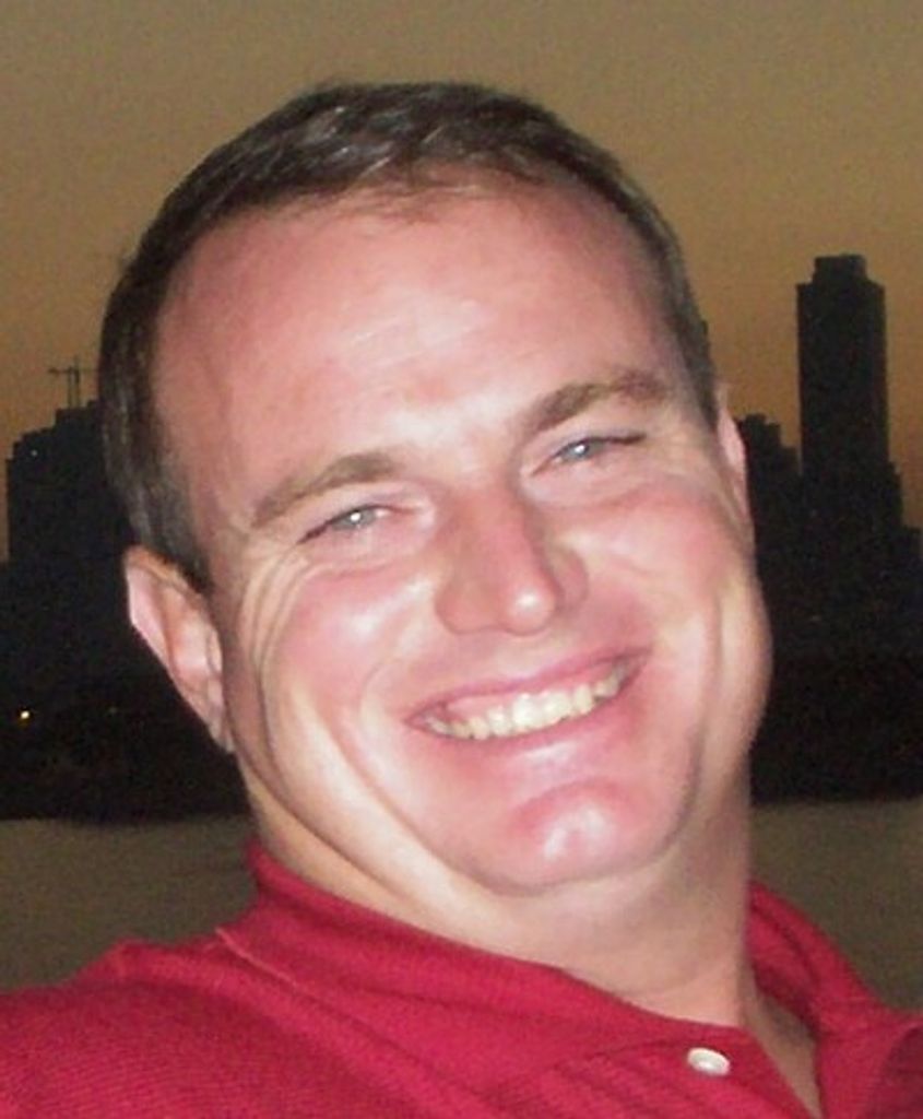 Timothy "Tim" Tharman