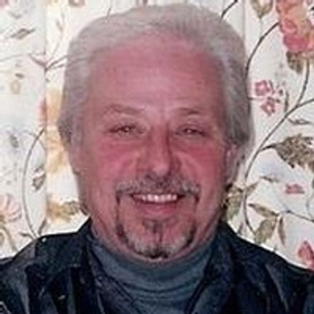 Guy  A. Simmons