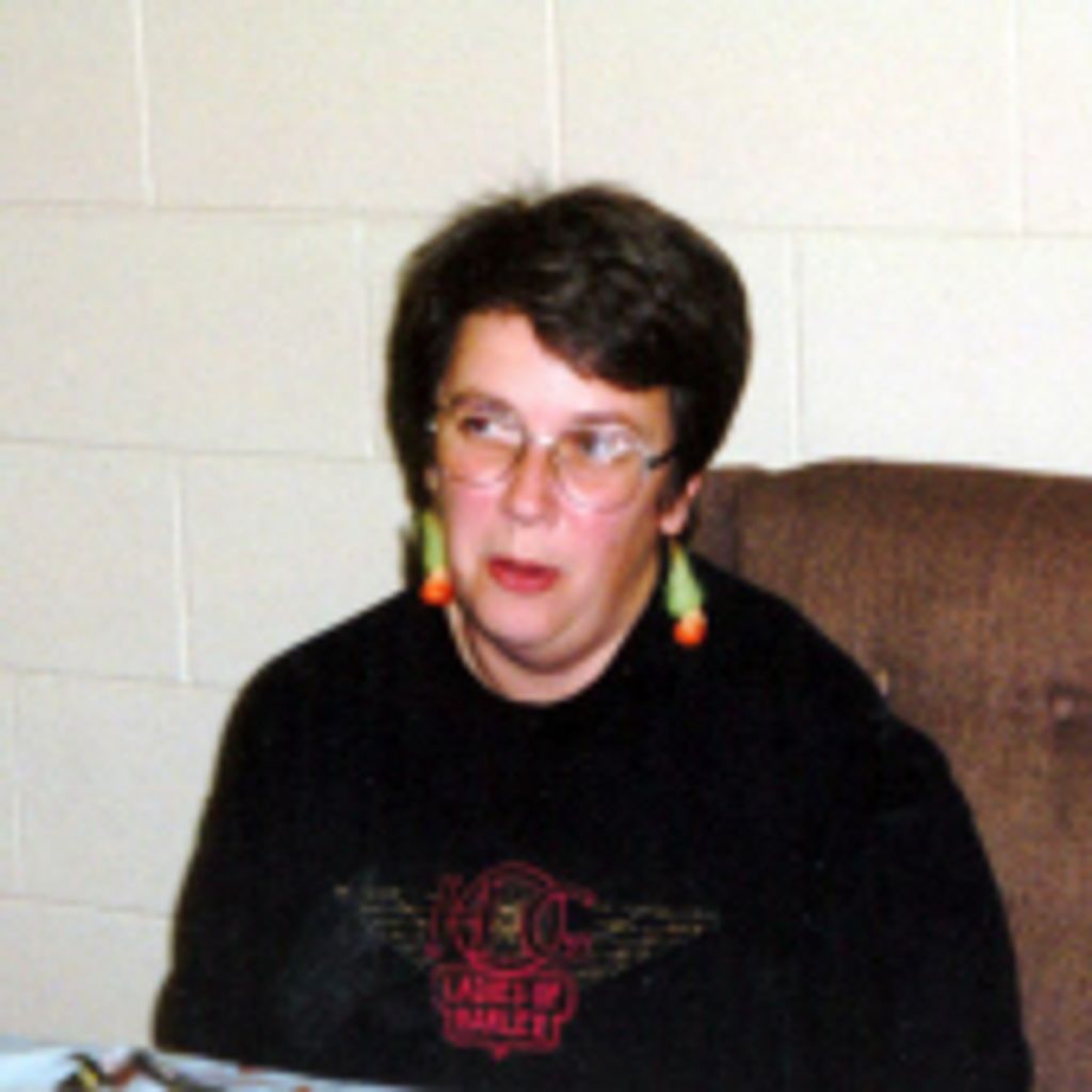 Joan M Miller