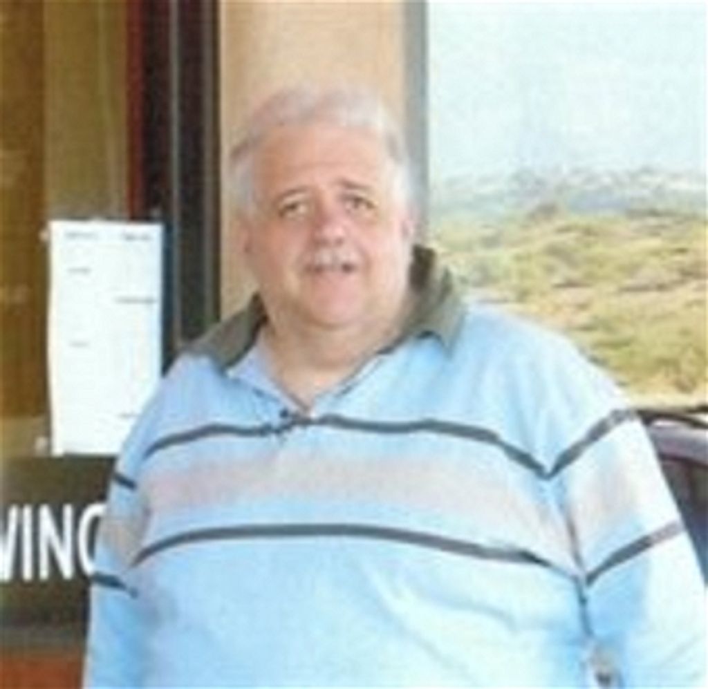 George E Koukoulas