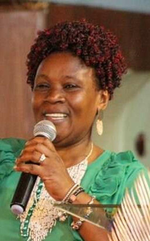 Jane Wanjiku Mbogo ( Kioi)