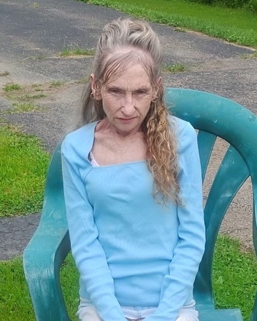 Lorieann E. THATCHER