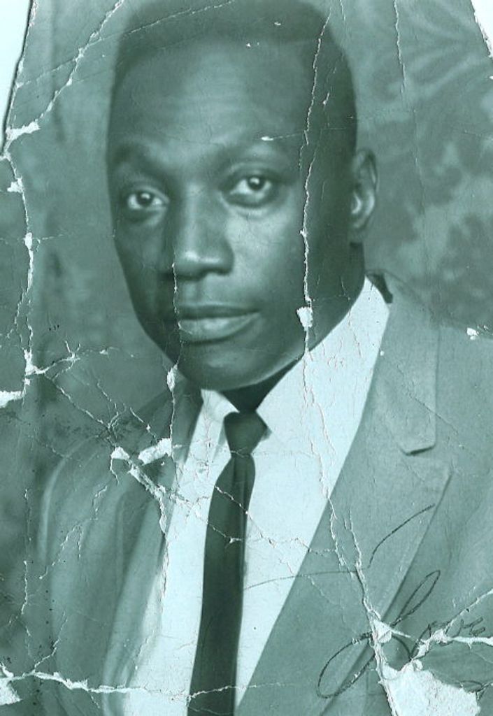 Charles A White