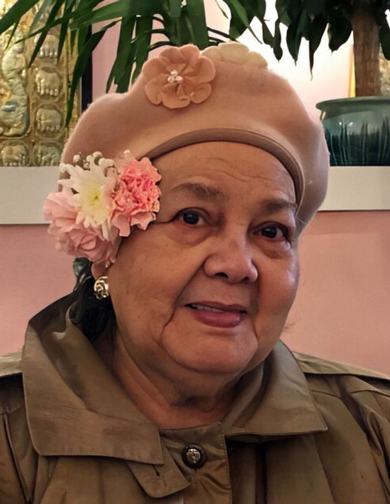 Ana M. (Canela)  Peña