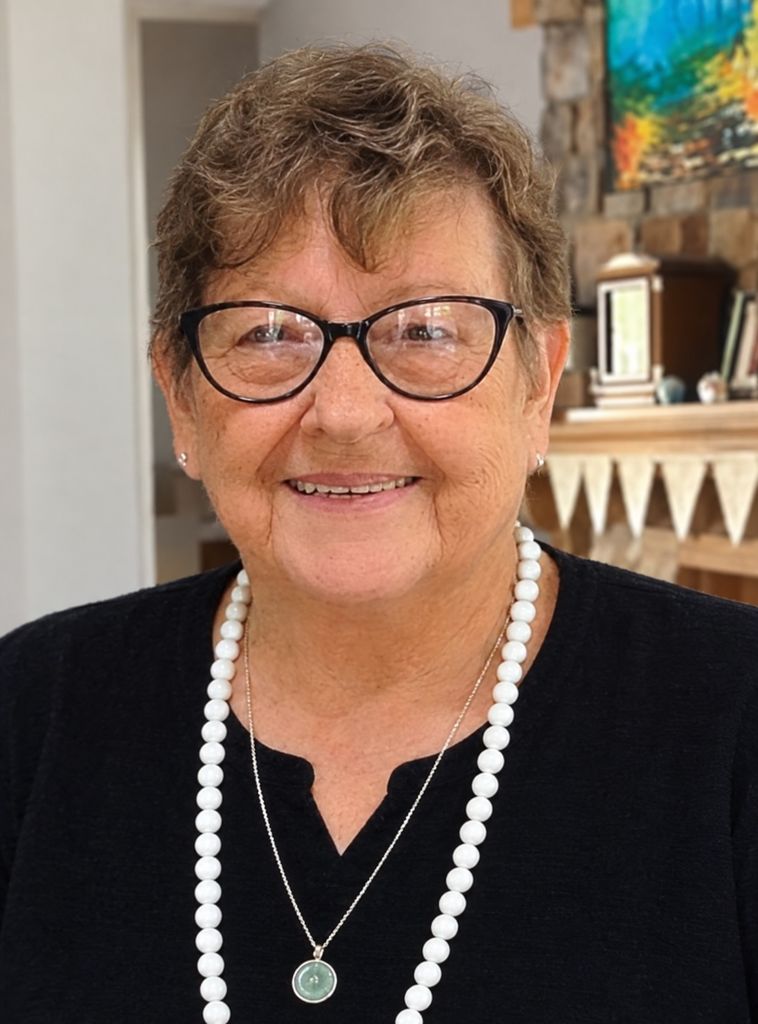 Joan E McElroy