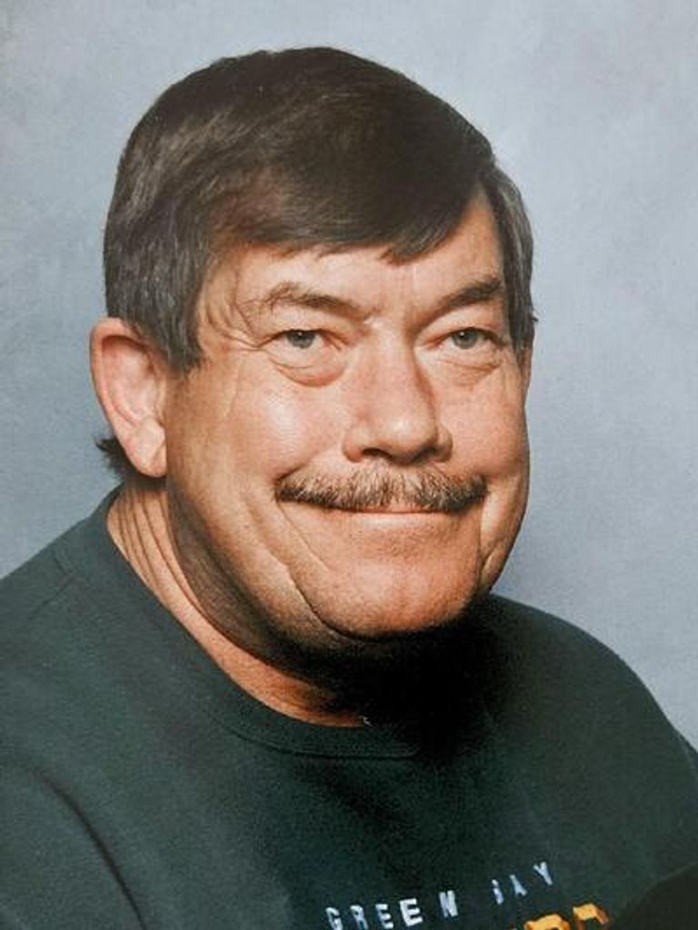 Leslie "Les" W. Schrader