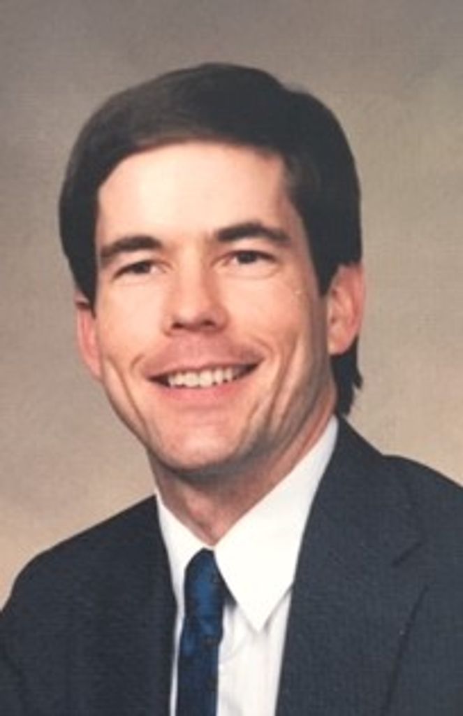 Roger J. "John" Holden