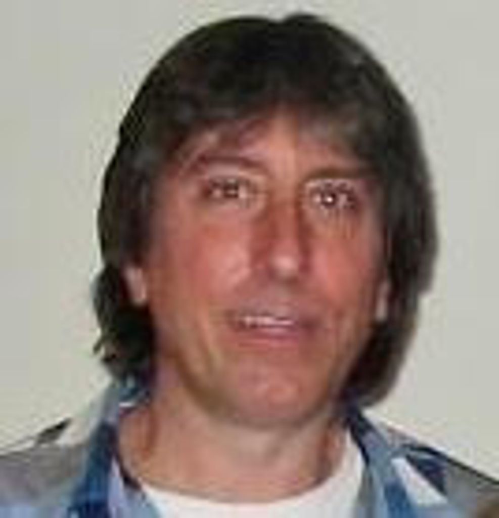 Thomas L. Divoky