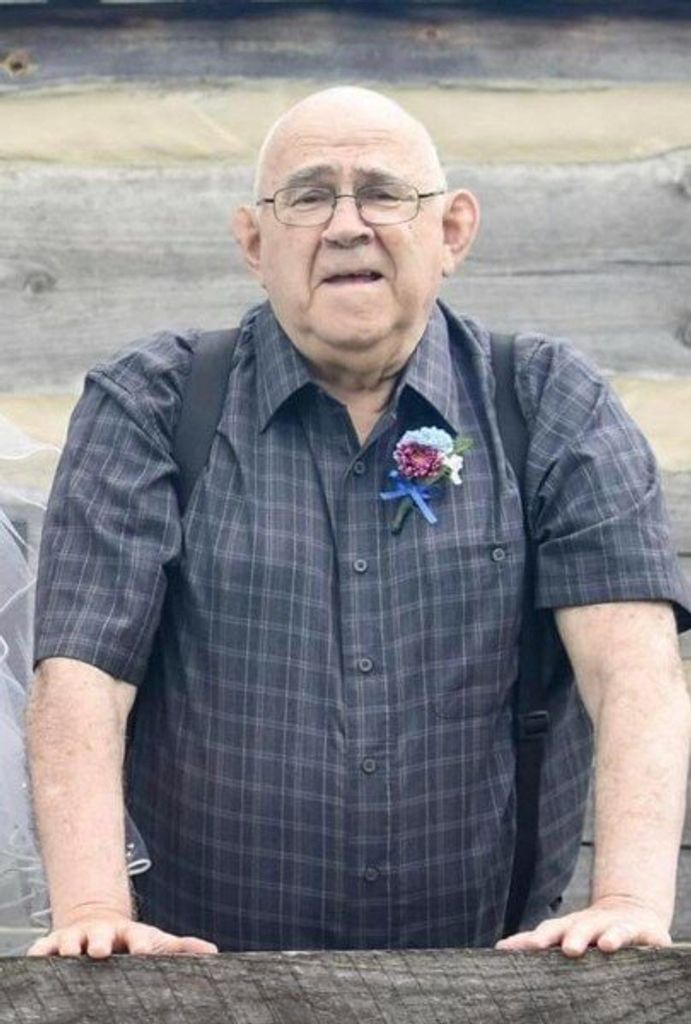 Dennis E. Wells
