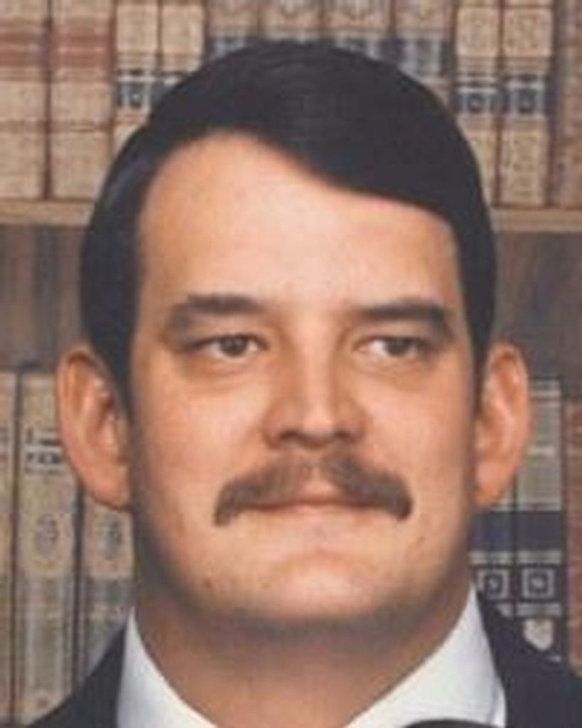 Gary J Downs