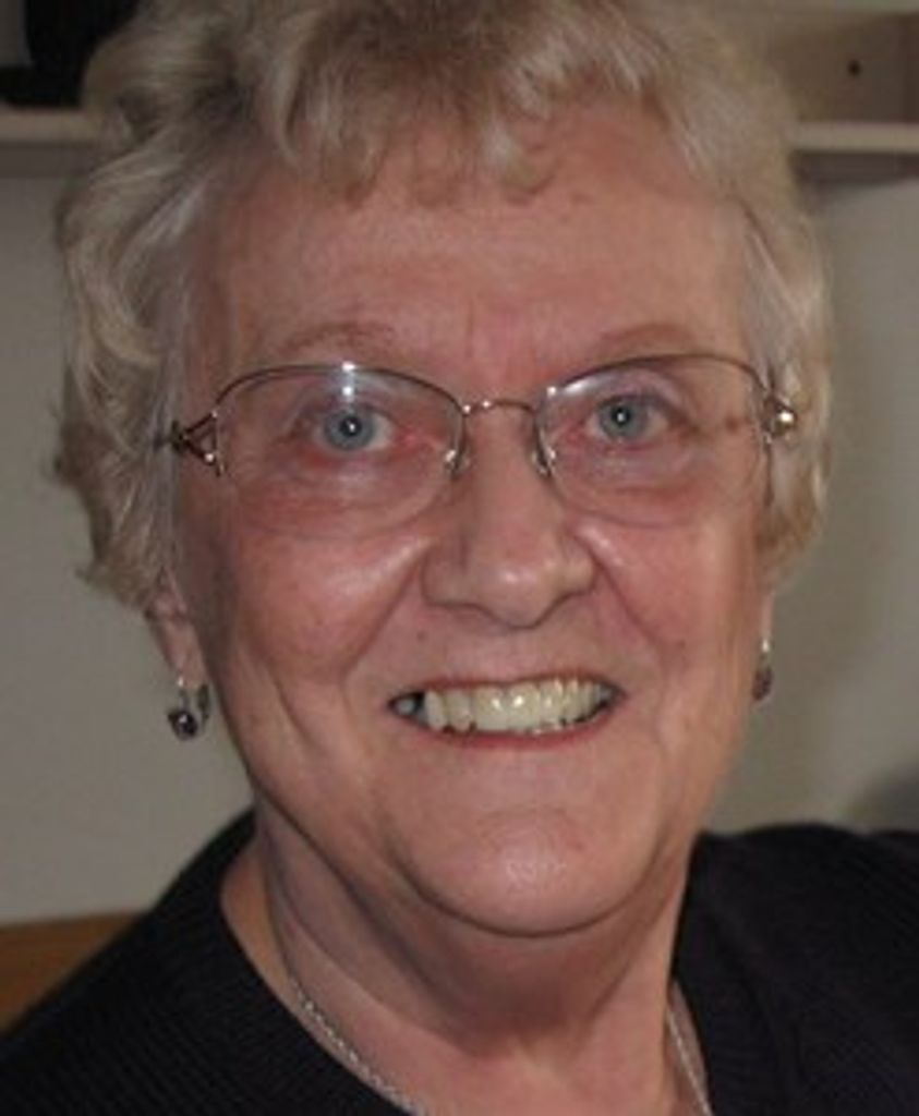 E. Joan Schroll