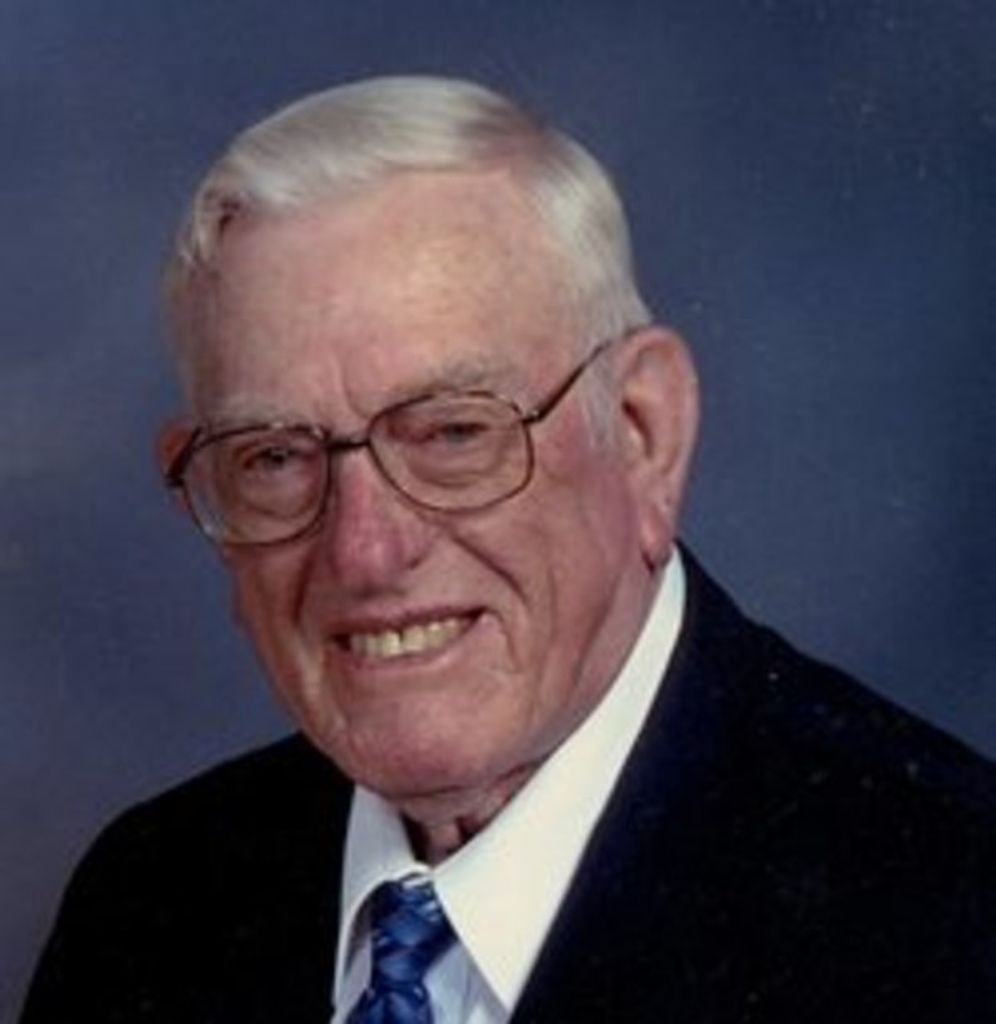Claude E. Thompson
