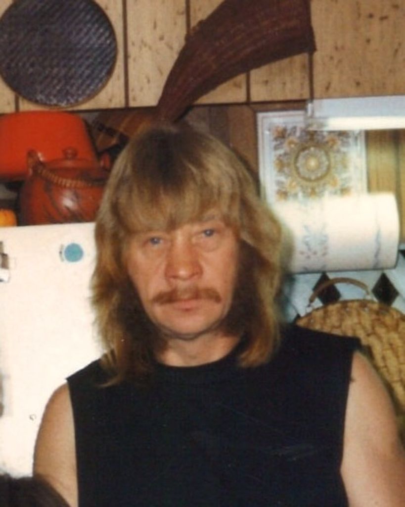 Daniel E. LAMPMAN