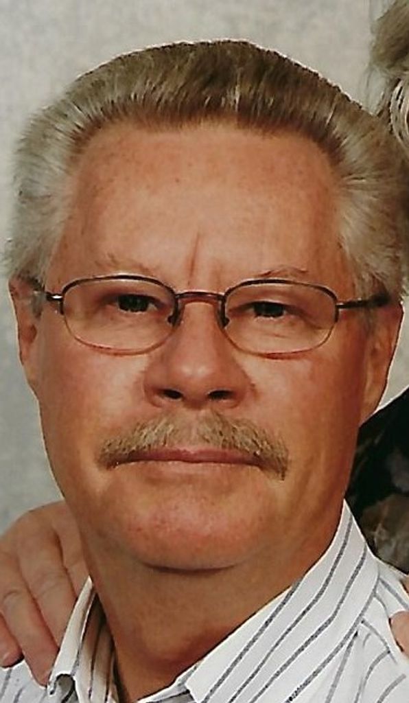 Tom E. Howell