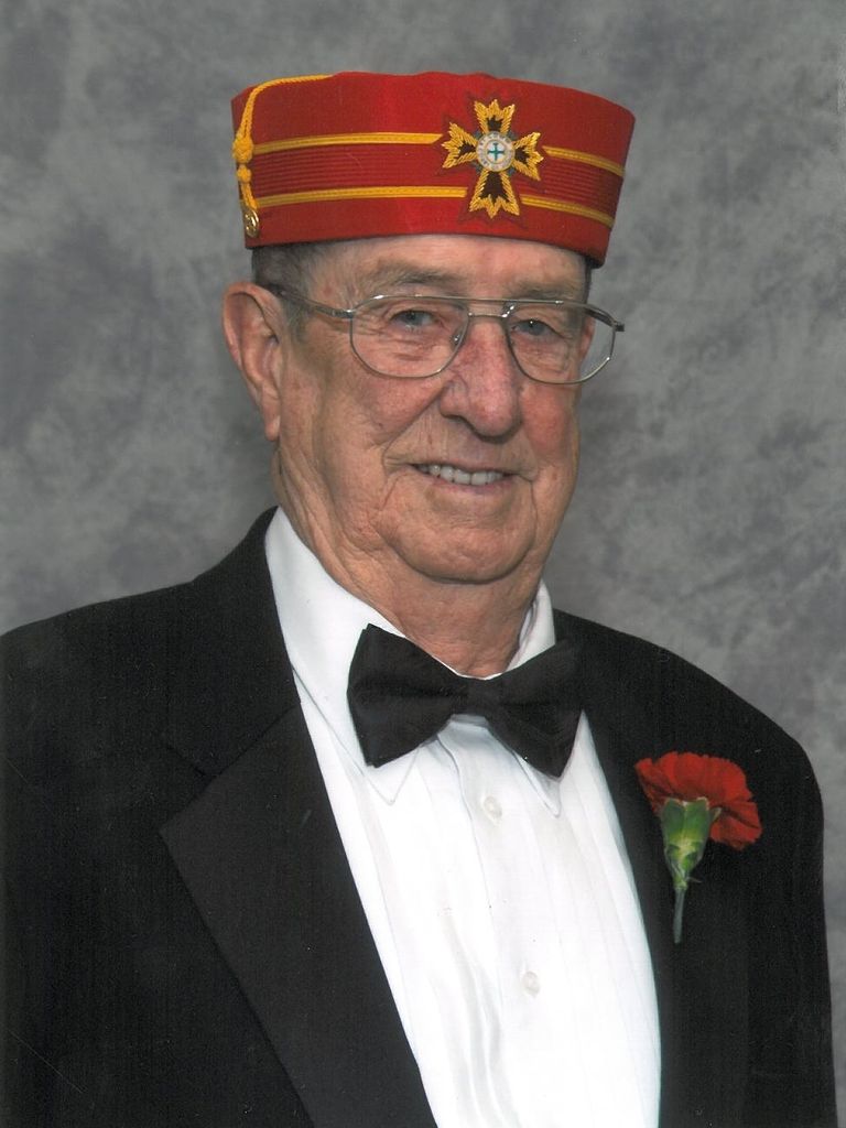 Victor  E. Carlock