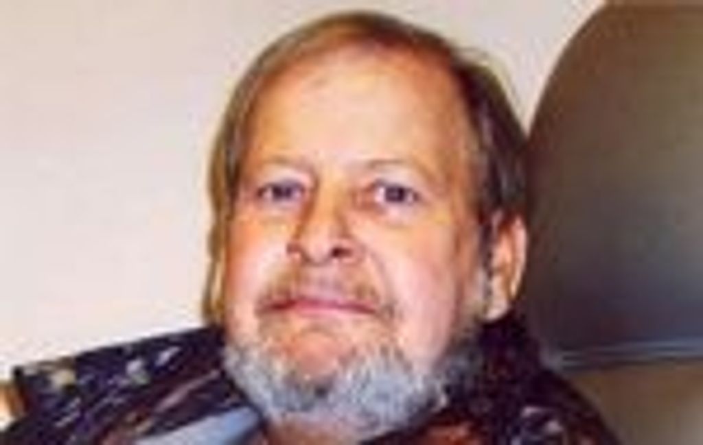MICHAEL L. TUCKER