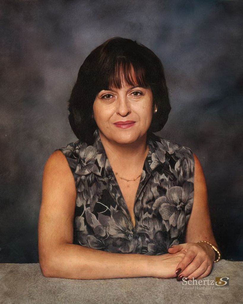 Maria E. Lisenbee