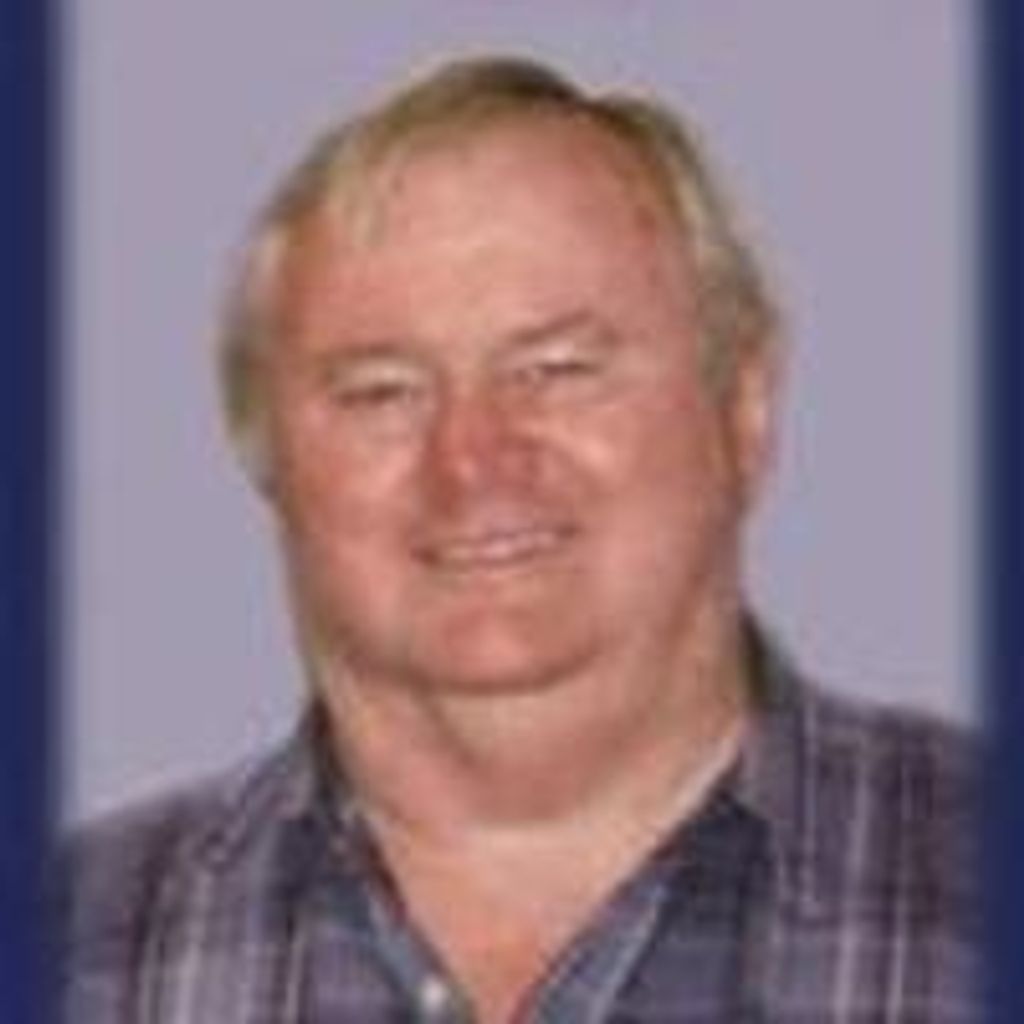 Paul  E. Divine