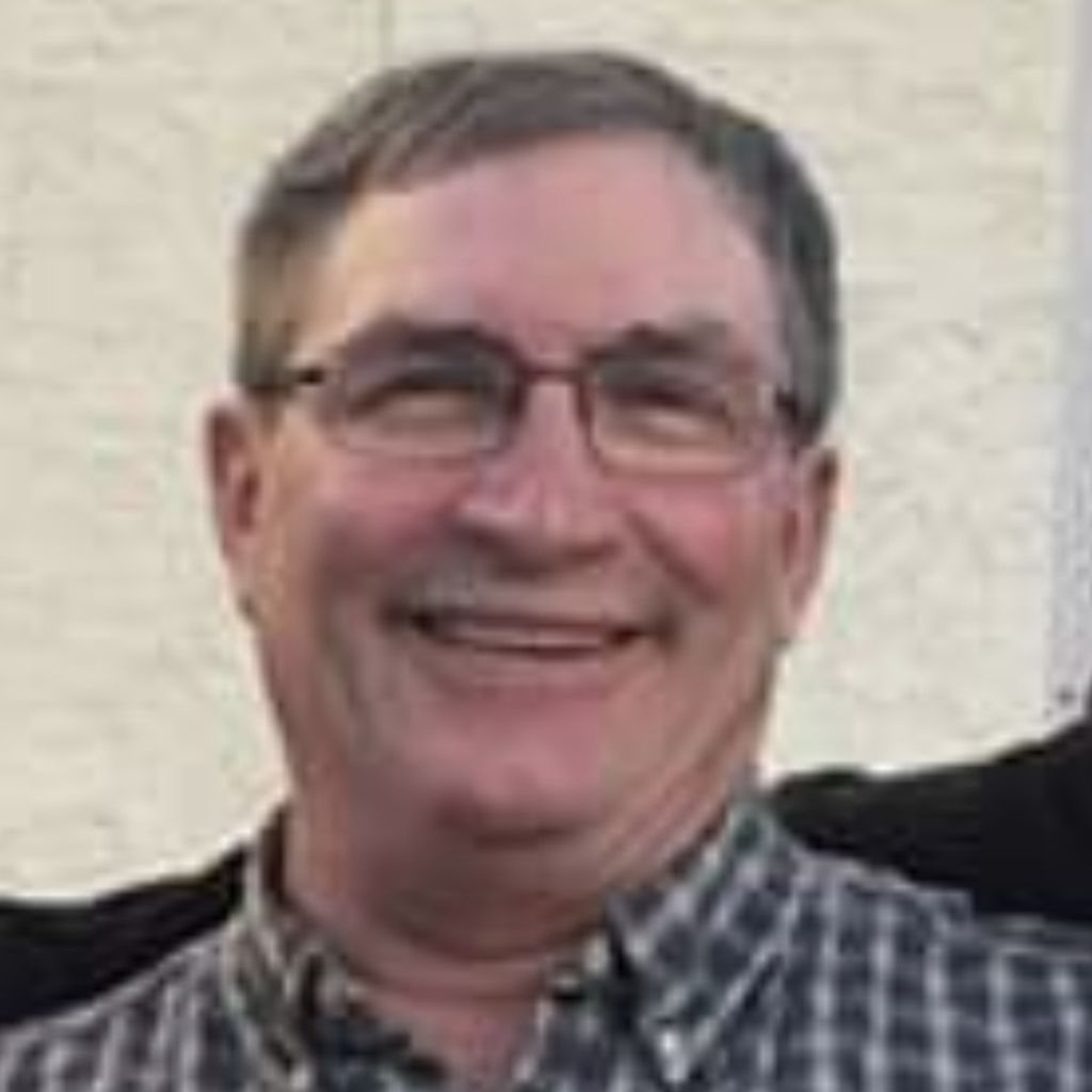 Mark E. Schweissinger