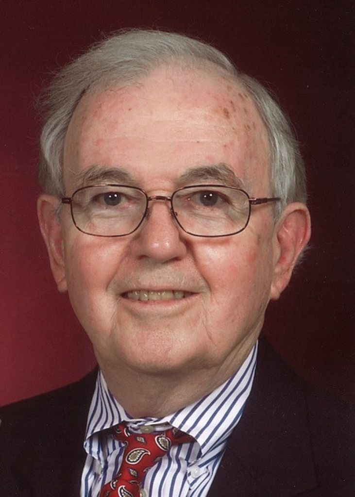 J. Thomas May