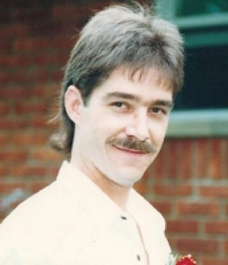 Michael  Larry WOEHLERT