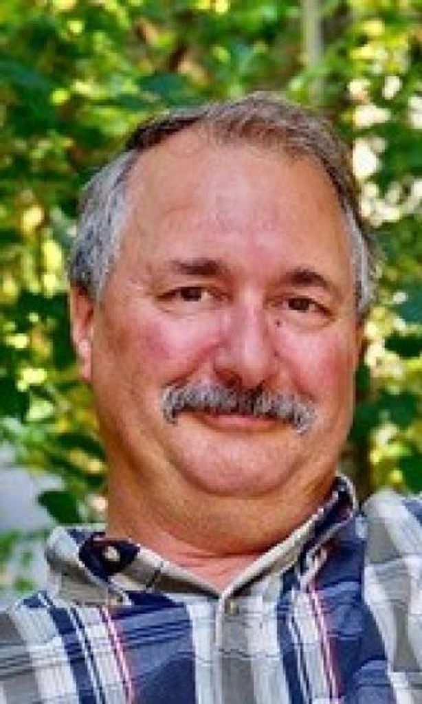 Curtis J. Ray