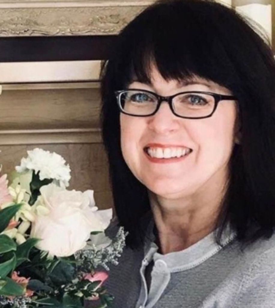 Debra E. Christy
