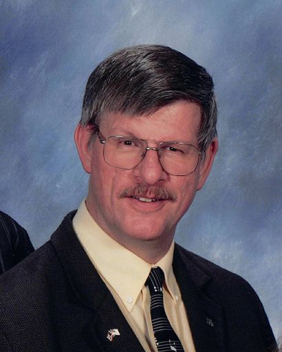 Gordon E. Mills's obituary image