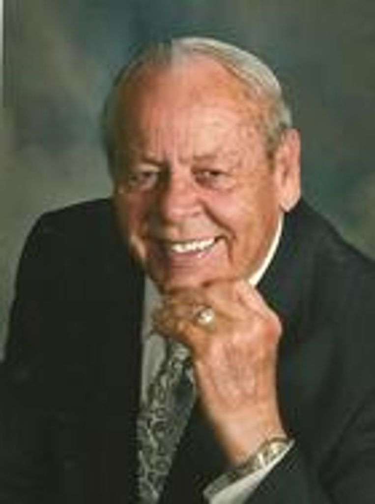 Olin  Dennis Adair