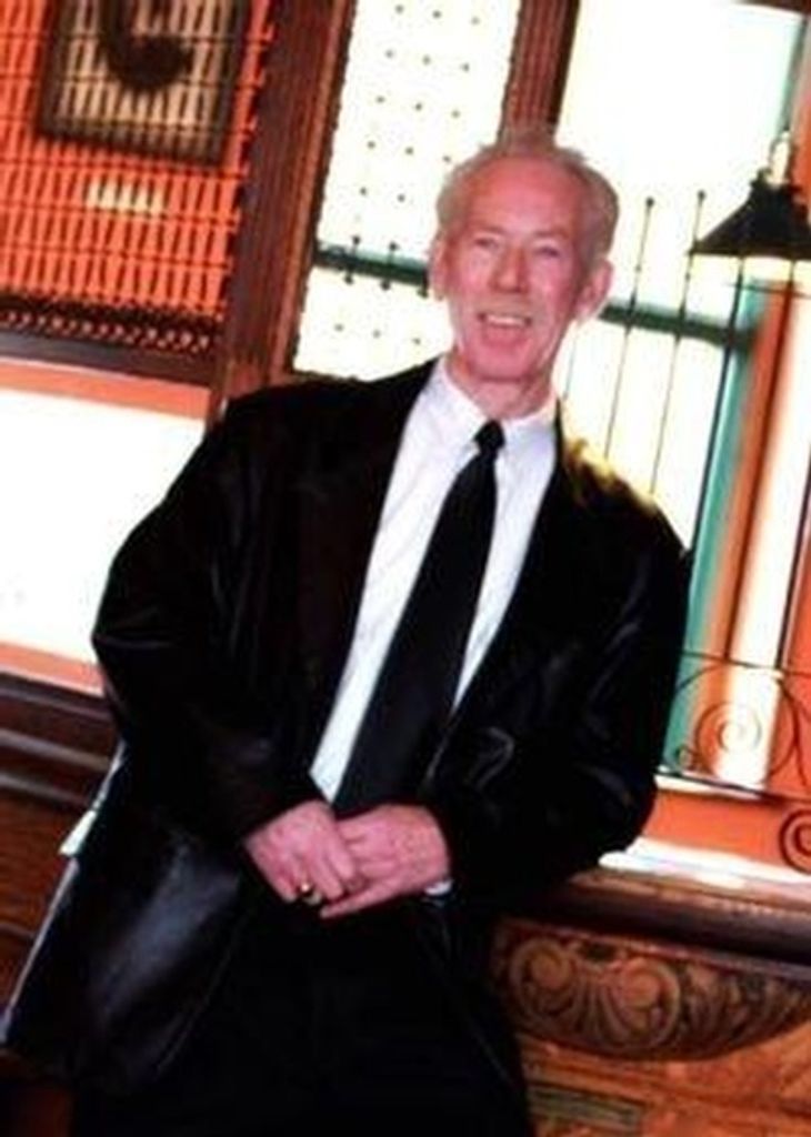 Johnny E. "John" Talley