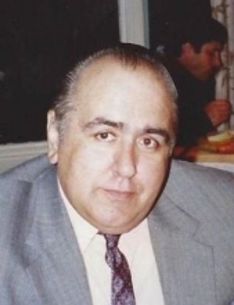 Roger E Poulin