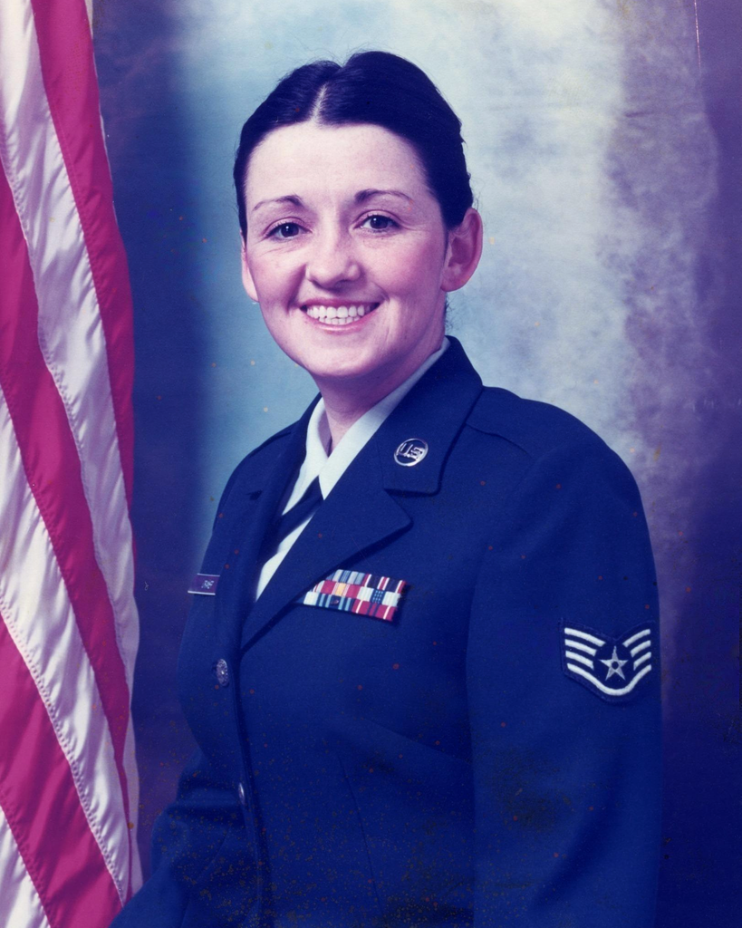 Charmain Joan "Char" Norman