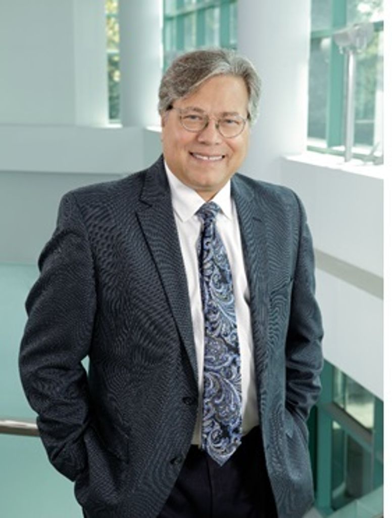 Dr. John R Cicero