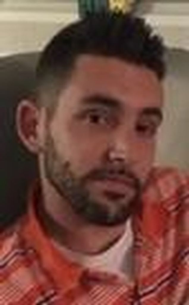 Travis Charles Albert Lezott