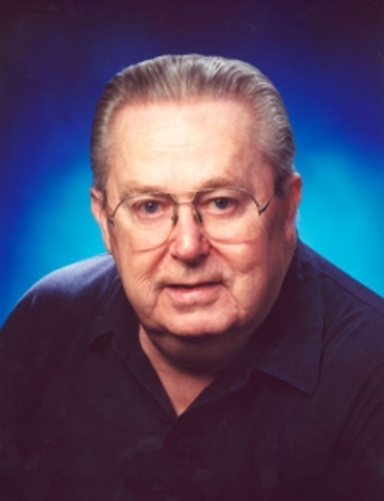 James E. "Poppy" Coates