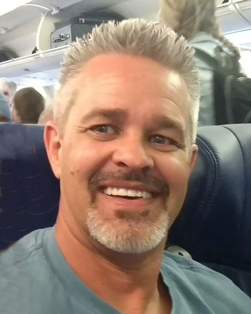 Mark E. Nesbitt