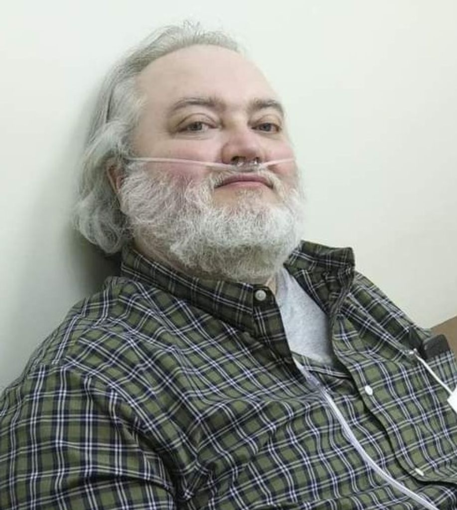 John E. Rosenberger