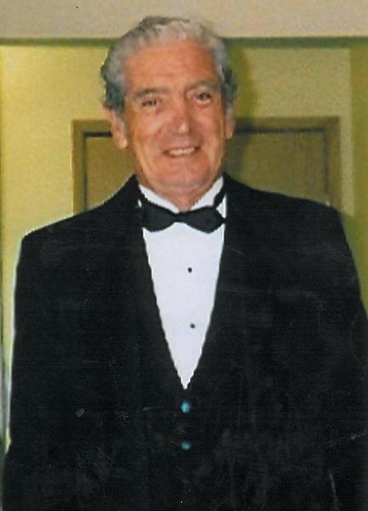 Joe  T. Martinez