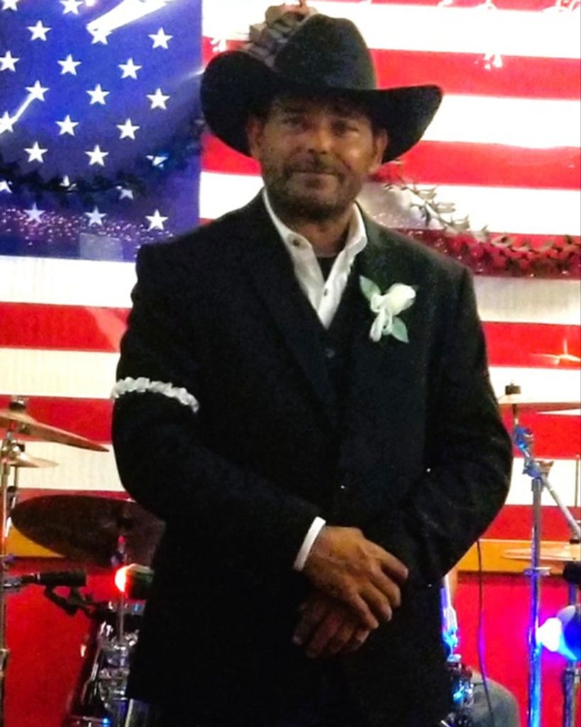 James Steven Reid "Cowboy" or "Reid"