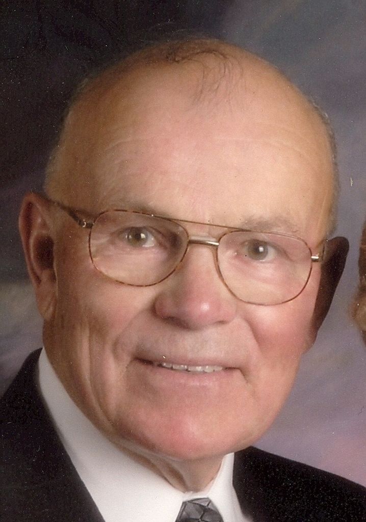 Mark L. Schneider