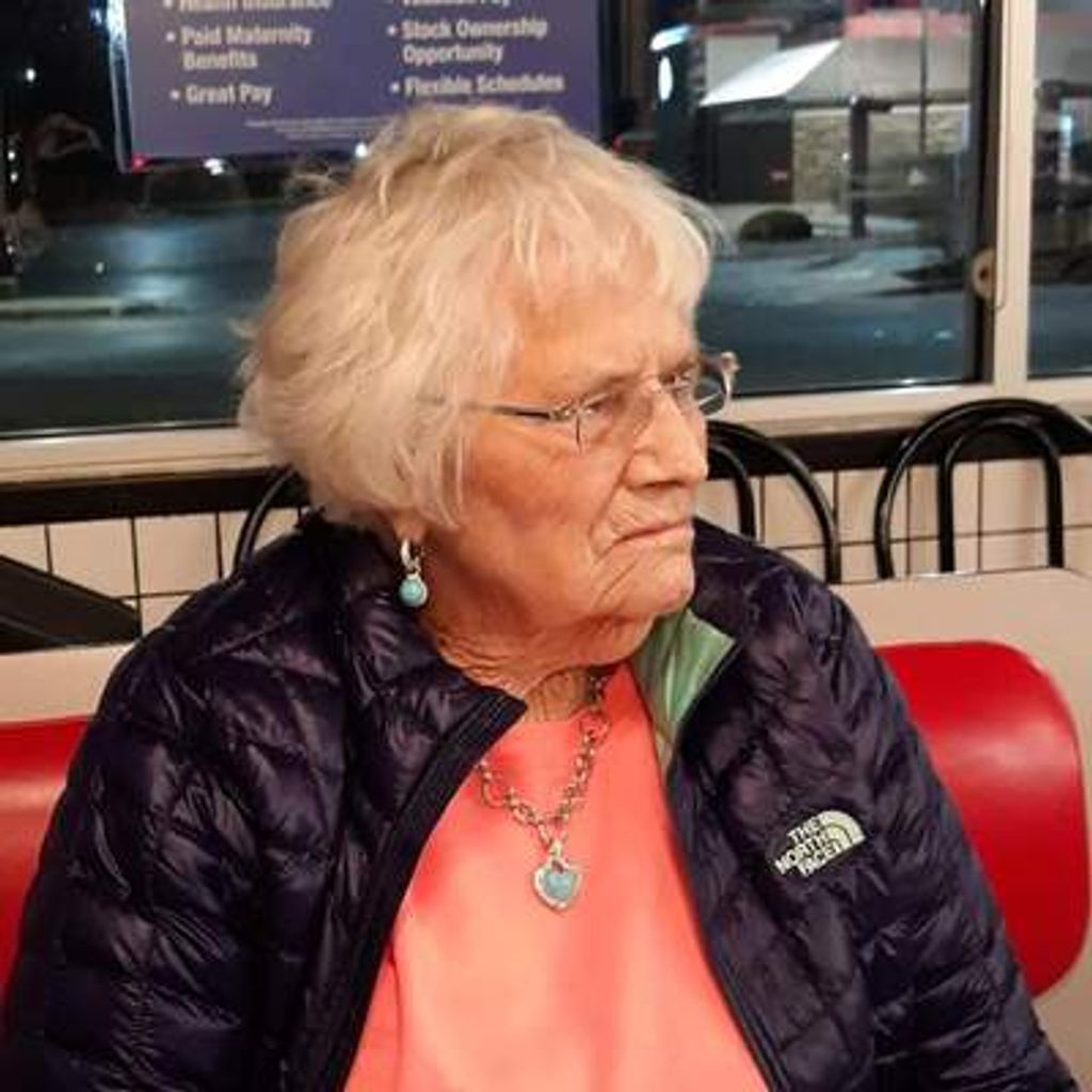E. Louise Grasher